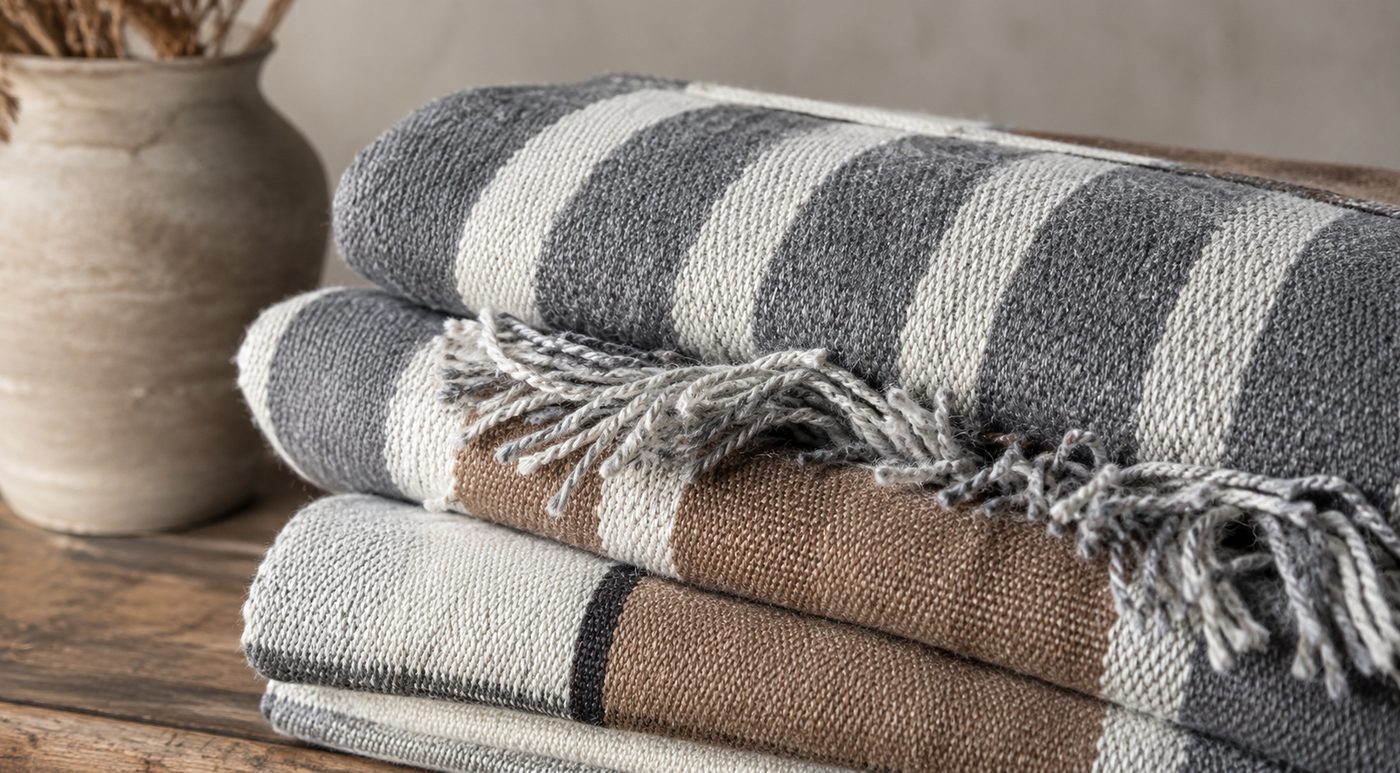 Stack of handwoven striped hallway runners
