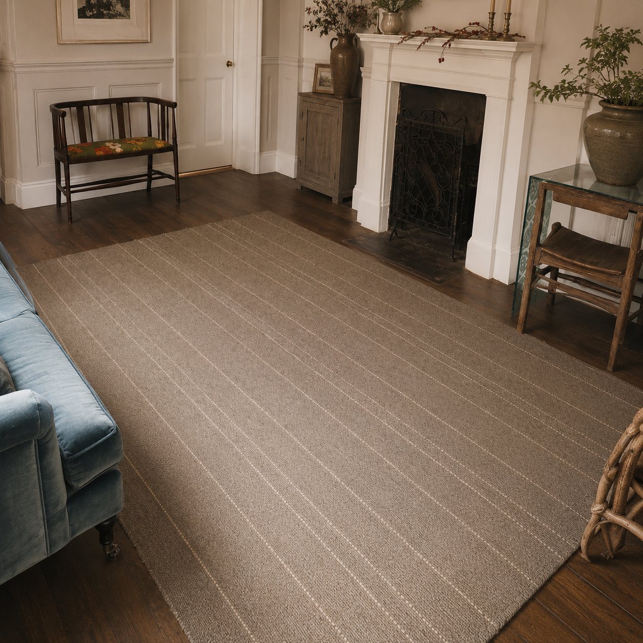 Brown with fine cream stripe handwoven goat hair rug in living room setting