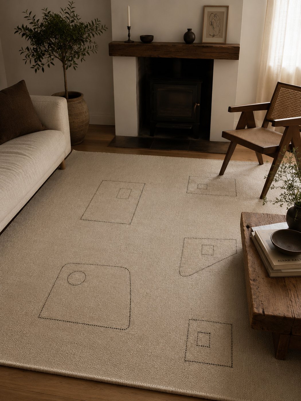 Cream, geometric motif handwoven goat hair rug