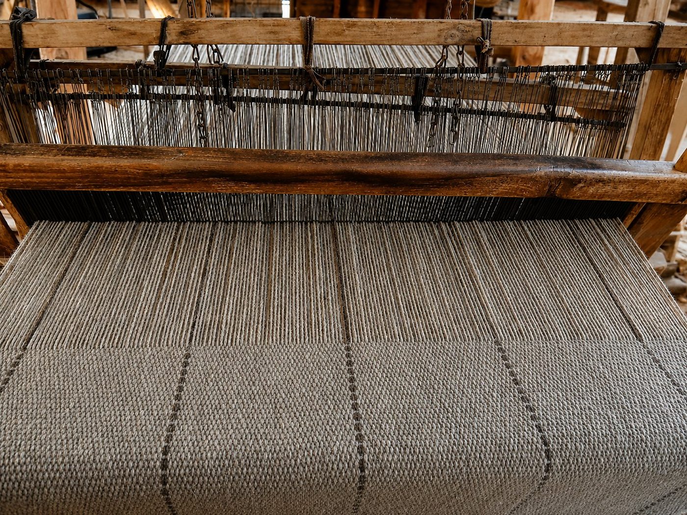 Traditional loom weaving a Coban rug